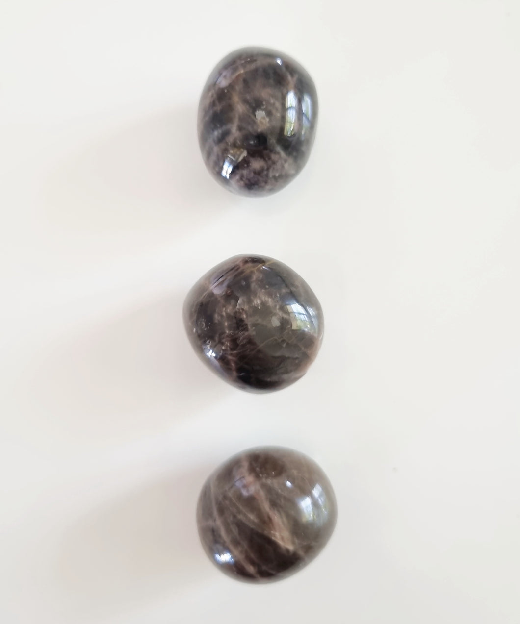 Black Moonstone tumbles